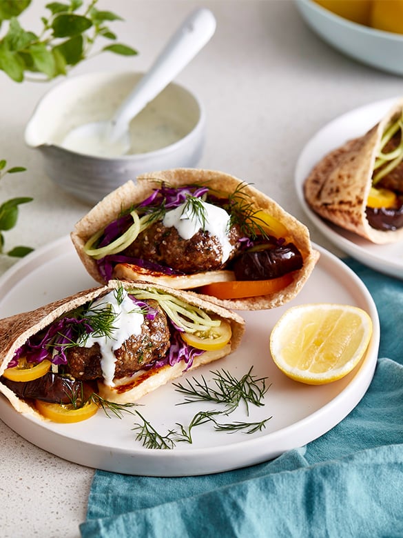Spiced lamb pitas with eggplant and fresh herbs