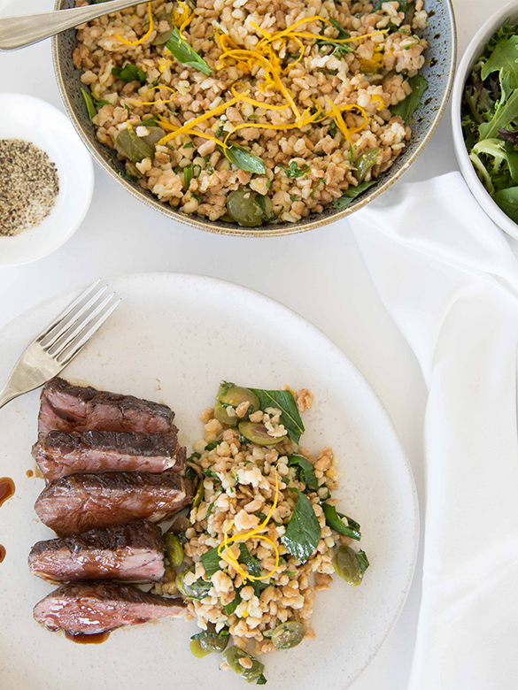 Lamb rump with fregula and olive salad