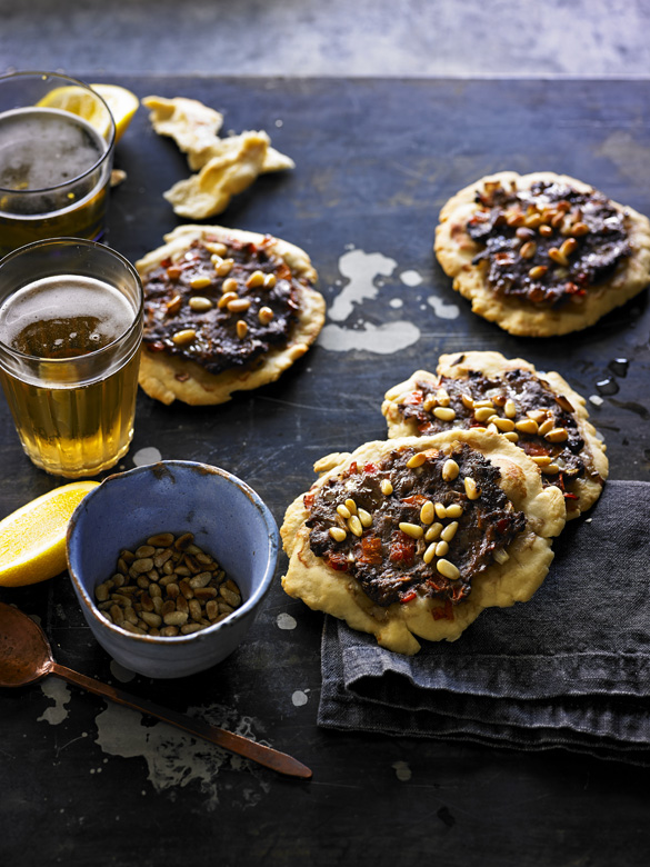 Lamb pastries with allspice, tomato and pine nuts