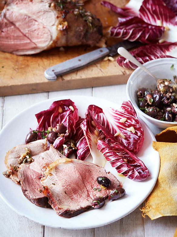 Leg of lamb with olive sauce and radicchio salad